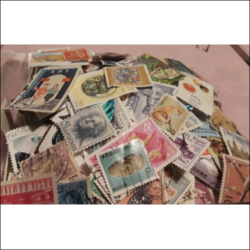 Lot of 260+ Worldwide Stamps in various conditions