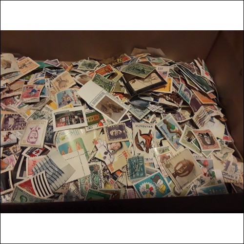 Huge collection of 1,300+ stamps from the World. ALL DIFFERENT!!!